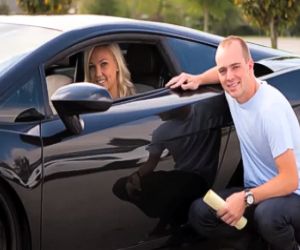 Blonde Woman buying a black car